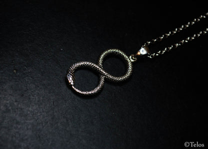 Sterling silver infinity snake pendant